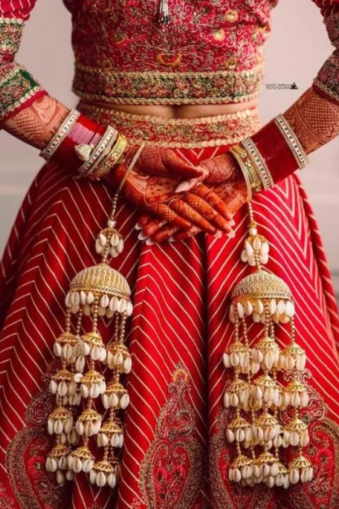Gold Kalire with Shells and Ivory Bead Detailing
